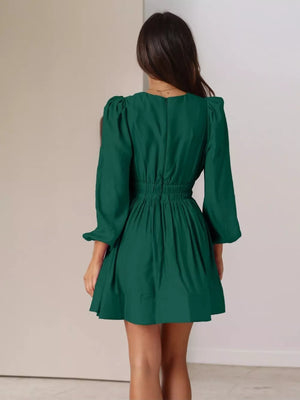 Army green V-neck mini dress with puff sleeves and cinched waist