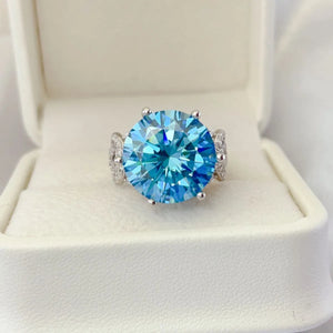 Celestial blue moissanite knot ring with pavé details on band