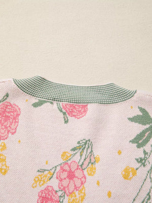 Floral v-neck knit sweater with pink flowers and green trim