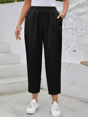 Black textured elastic waist cropped trousers with pockets