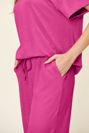 Hot Pink waffle knit loungewear set with drawstring waist and pockets.