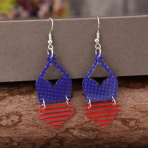 Patriotic bikini acrylic drop earrings in dark blue with stars and red striped bottoms.