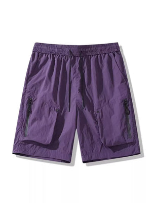 Purple lightweight cargo shorts with elastic waist, drawstring, and zipper pockets.