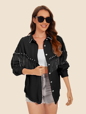 Black denim trucker jacket with fringe and pearl embellishments on sleeves and collar