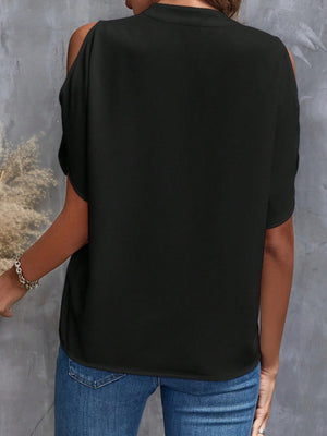 Black open-shoulder blouse with keyhole detail, 100% polyester.
