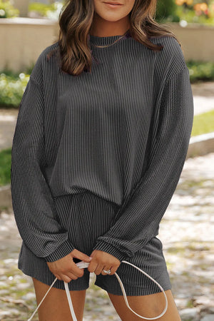 Black ribbed knit matching set with crew neck long sleeve top and shorts