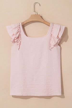 Blush pink textured blouse with square neck and ruffle cap sleeves.