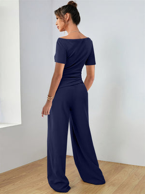 Boat neck jersey co-ord set in dark navy with wide leg pants.