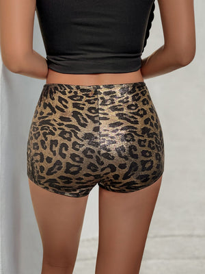 Metallic leopard print hot shorts with a high waist and a shiny finish.