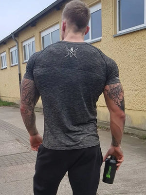 Performance knit t-shirt in dark gray with a textured pattern and logo on the back.