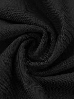 Black ribbed knit fabric detail of an elegant off-shoulder maxi dress.