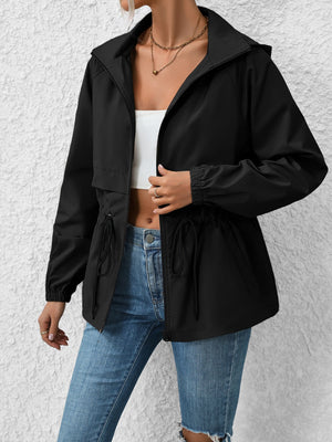 Black hooded utility jacket with cinched waist and drawstring details.