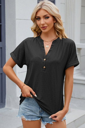 Black textured henley tee with rolled sleeves and button detail