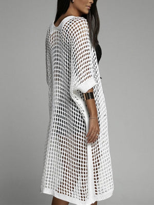 White open-knit duster cardigan with short sleeves and a relaxed fit.
