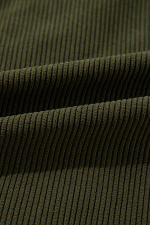 Moss corduroy fabric detail of a bomber jacket