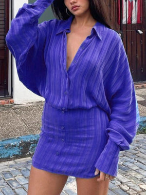 Button-down striped mini dress in royal blue with a collared neckline and long sleeves.