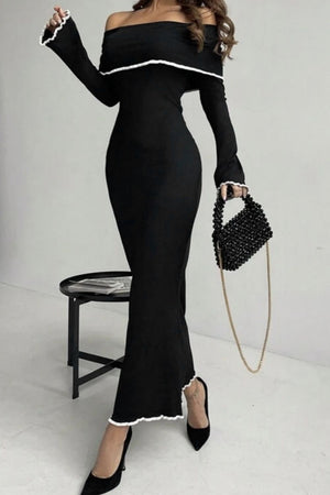 Black off-shoulder maxi dress with ruffled trim and long sleeves.