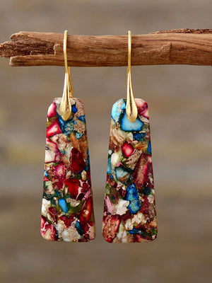 Geometric stone drop earrings in multicolor with gold hooks.