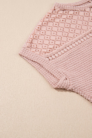 Dusty pink waffle knit top with intricate lace yoke detail and textured sleeves.