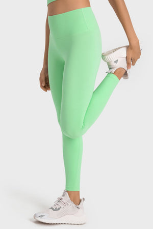 Green seamless high-waist performance leggings with a sculpted fit.