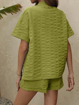 Lime textured resort shirt and shorts set with short sleeves and collared neckline.