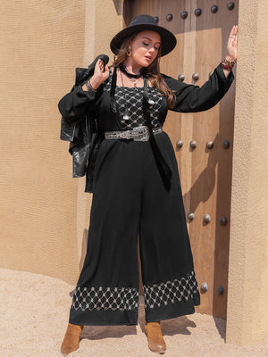 Black viscose palazzo jumpsuit with square neck and embroidered hem.