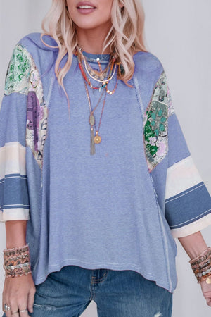 Patchwork stripe raglan sleeve tee in dusty blue with artistic boho print panels and casual relaxed fit.