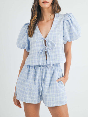 Light blue plaid puff sleeve tie-front set with matching shorts.