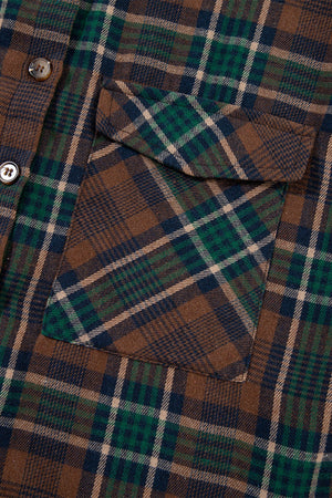 Plaid snap jacket in caramel with chest pocket and button detail.
