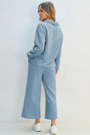 Light blue textured polo sweatshirt and wide-leg culottes outfit set