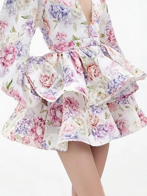 Blooming ruffle mini dress with a floral print and v-neckline.