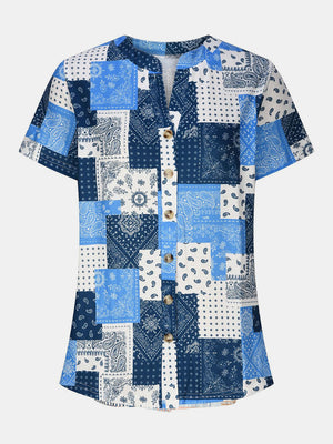 Blue bandana patchwork henley blouse with button front and short sleeves.