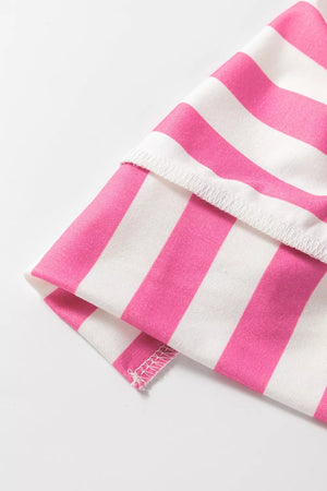 Pink and white striped oversized maternity overshirt with visible stitching details.