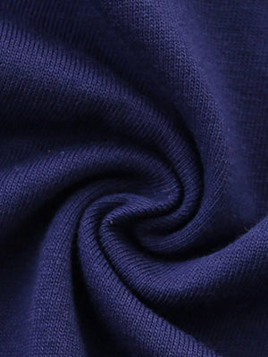 Navy blue cotton fabric detail of a baby outfit.