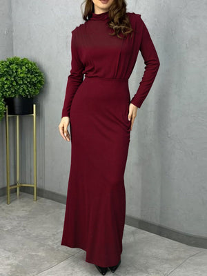 Burgundy mock neck maxi dress with long sleeves and defined waist