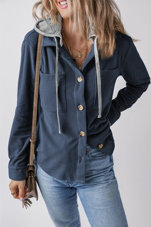 French Blue corduroy shirt jacket with contrast hood and button details.