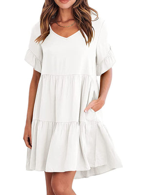 White ruffled sleeve mini dress with pockets and tiered skirt.