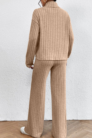 Ribbed knit turtleneck loungewear set in tan with wide leg pants and long sleeves.