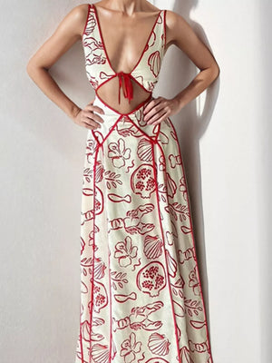 Backless maxi dress with oceanic print, deep V-neck, cutouts, and red trim.