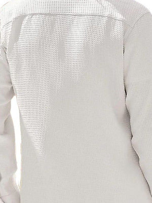 Men's white waffle knit button-up shirt with long sleeves.