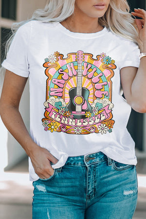 White t-shirt with Nashville guitar graphic and 70s-inspired floral design