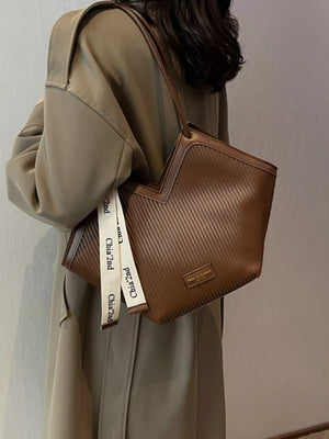 Brown ribbed texture large shoulder bag with white logo strap detail
