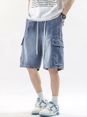 Men's denim cargo shorts in Vintage Blue with drawstring waist and large side pockets.