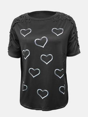 Black t-shirt with white heart print and lace trim on shoulders and sleeves.