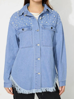 Medium wash denim shirt with pearl embellishments and frayed hem