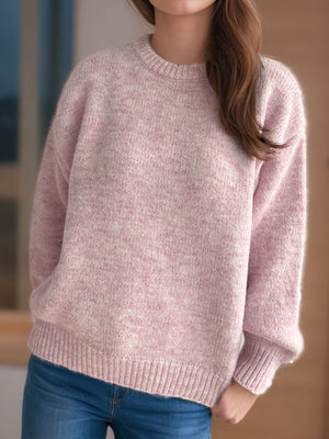 Oversized crewneck sweater in dusty pink textured knit with ribbed cuffs and hem.