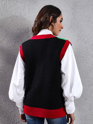 Black acrylic knit vest with red trim and subtle green detail on shoulder.