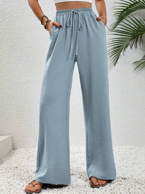 Light Blue textured palazzo trousers with drawstring waist and pockets