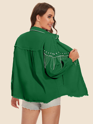Dark green trucker jacket with fringe and pearl embellishments on the shoulders and frayed hem.