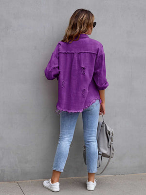 Purple distressed denim shacket with frayed hem and cuffs, styled with light wash jeans.